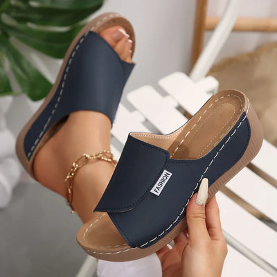 "Selene | Orthopedic Wedge Heel Sandals™" can be rewritten as "Selene | Comfort-Focused Wedge Heel Sandals™".