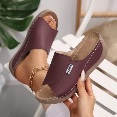 "Selene | Orthopedic Wedge Heel Sandals™" can be rewritten as "Selene | Comfort-Focused Wedge Heel Sandals™".