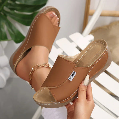 "Selene | Orthopedic Wedge Heel Sandals™" can be rewritten as "Selene | Comfort-Focused Wedge Heel Sandals™".